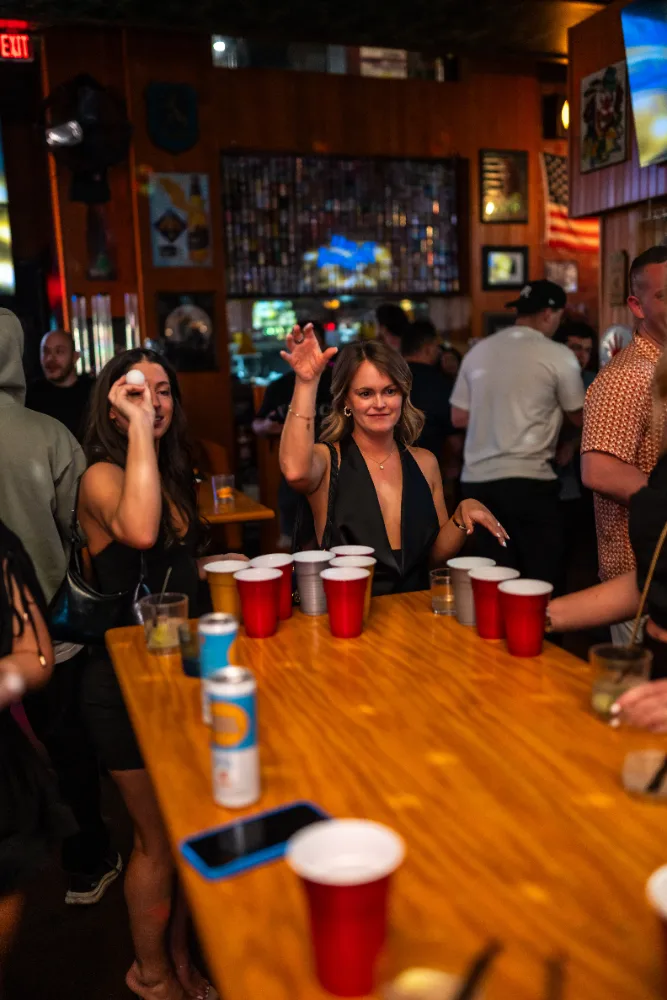 Beer pong on the big table at Mother Tucker's Tavern in Old Town Scottsdale