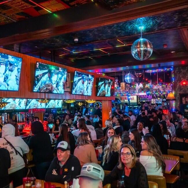 Weekend Crowd at Mother Tuckers Tavern - Mother Tucker's Tavern Crowd of patrons enjoying nightlife at Mother Tuckers Tavern in Scottsdale